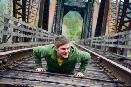 TJ exercising and getting his pushups in on an abandoned railroad bridge