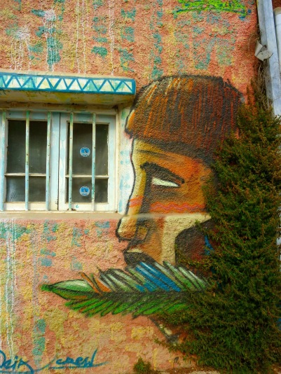 Mural painting of a native man in the UNESCO World Heritage site of Valparaiso