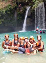 All smiles after jumping the largest cliff jump at Kawasan Falls in Cebu, Philippines